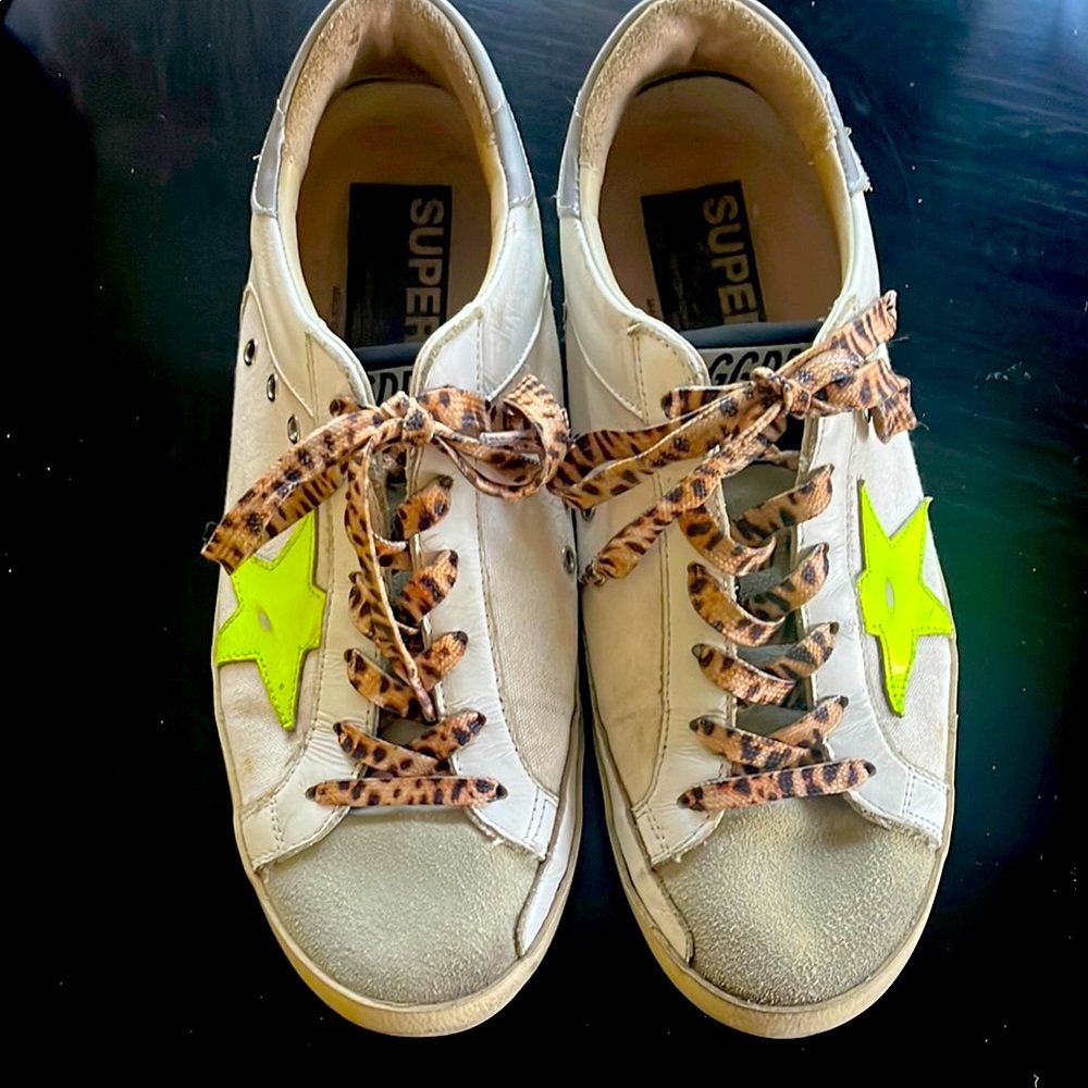 Great Goose sneakers. White with neon yellow/green stars. Great condition!